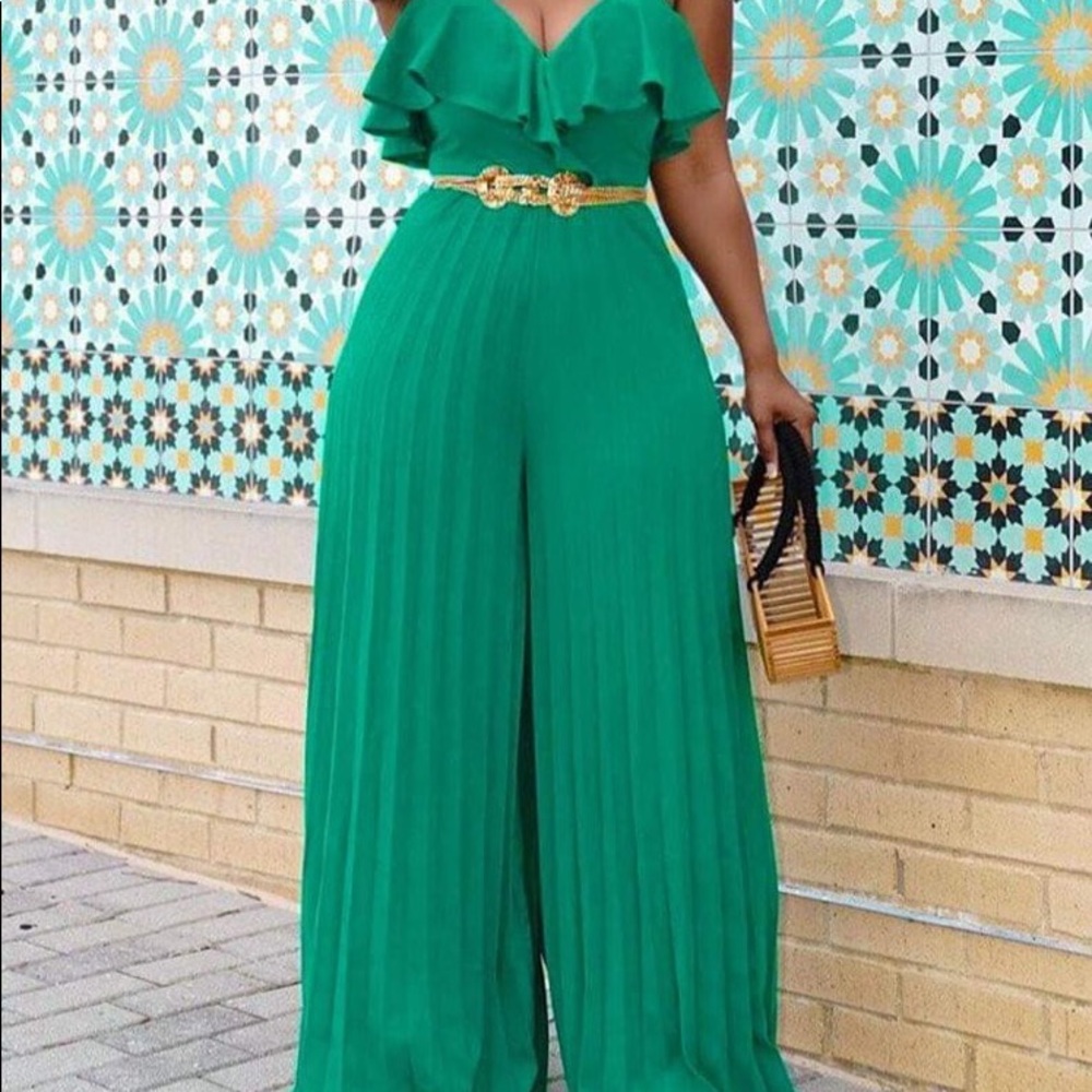 Green romper in medium